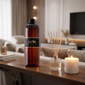 Hotel-style fragrance oil bottle on a console shelf